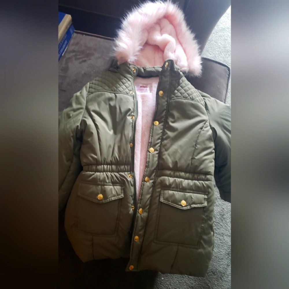 Adorable khaki colored jacket lined with baby pink fur never worn.